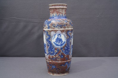 A rare Chinese blue, white and underglaze red rouleau vase, Kangxi